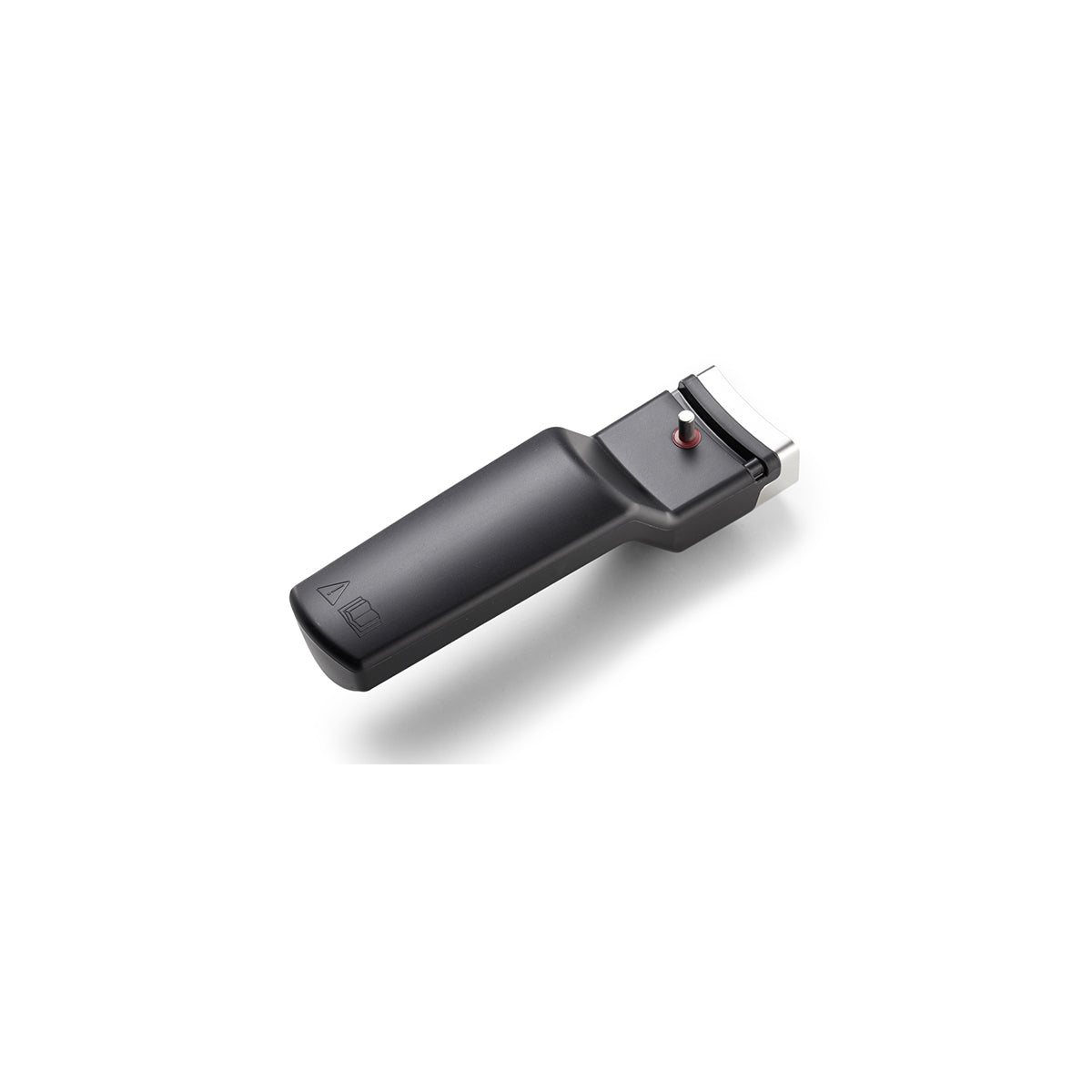 Fissler Vitavit® Pot Handle for 26 cm Pressure Cooker in modern, functional white design, next to a black electric hair clipper.