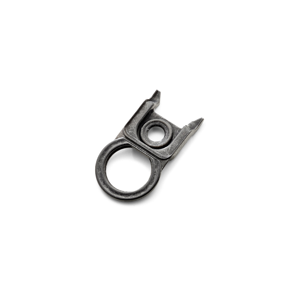 Ein Präzisionswerkzeug aus Metall mit rundem Griff und zwei Zinken, das an das moderne, funktionale Design von Fissler erinnert, auf weißem Hintergrund.
