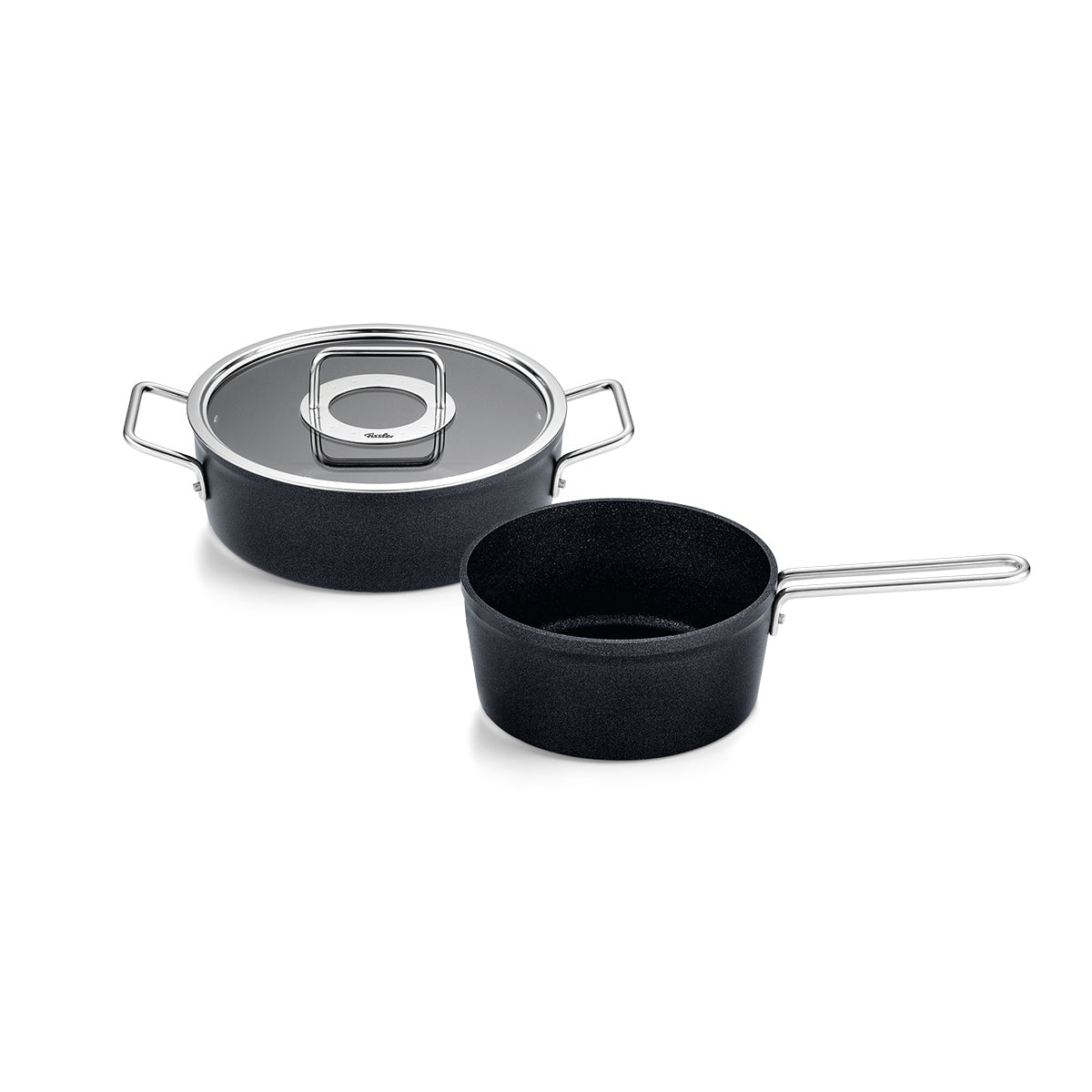 Fissler Adamant® 2-piece non-stick Cookware Set with Glass Lid, metal handles; quality and innovation from German production on a white background.