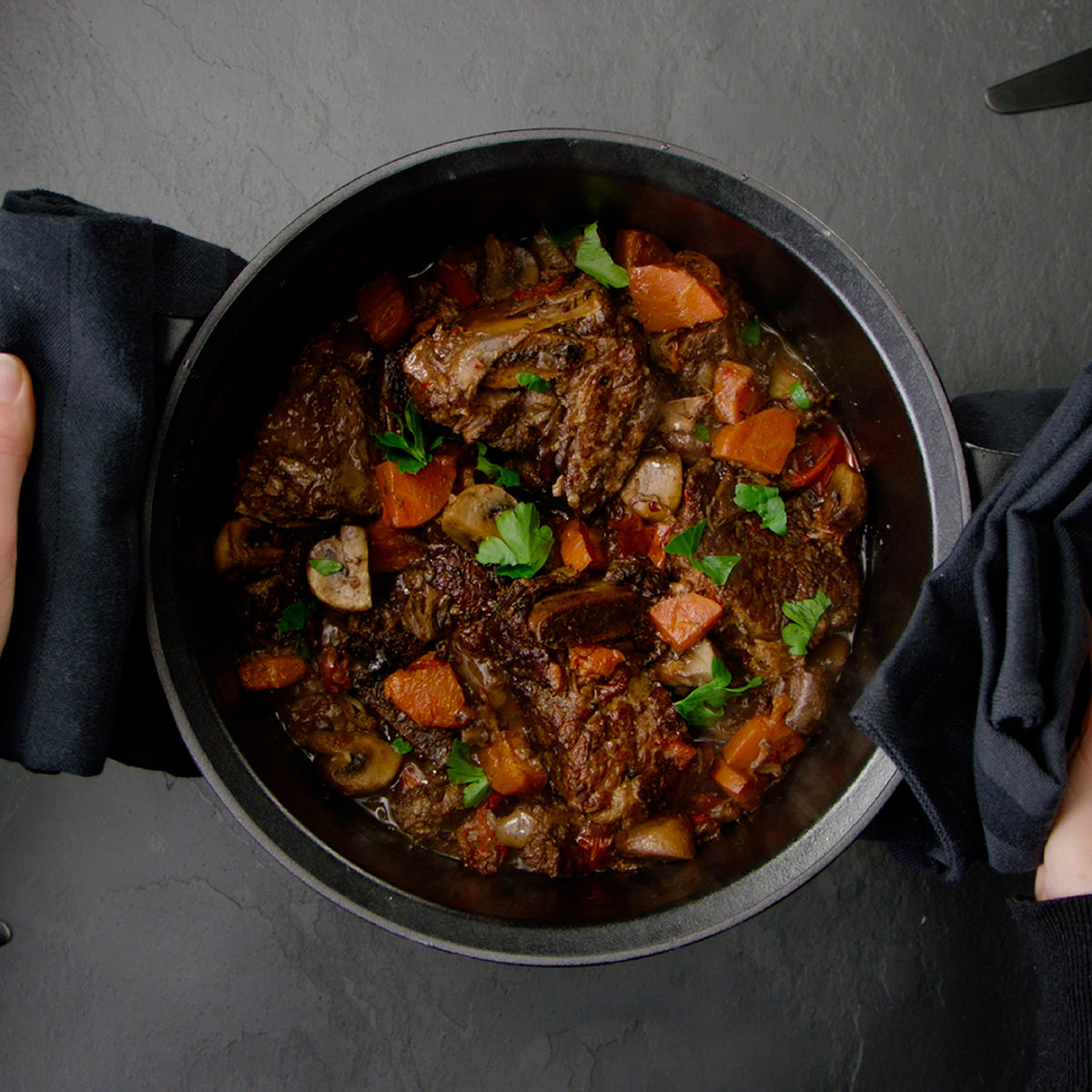 Beef goulash with carrots, mushrooms and parsley in the Fissler Original-Profi Collection® cast iron Cooking Pot - German precision cookware.